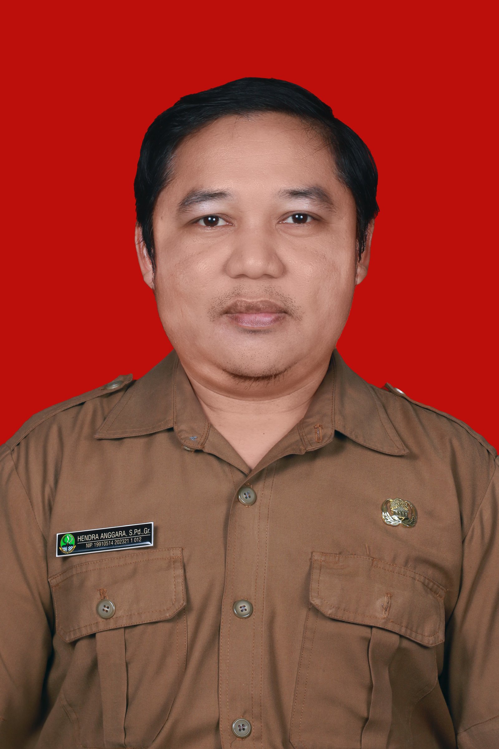 Hendra Anggara, S.Pd